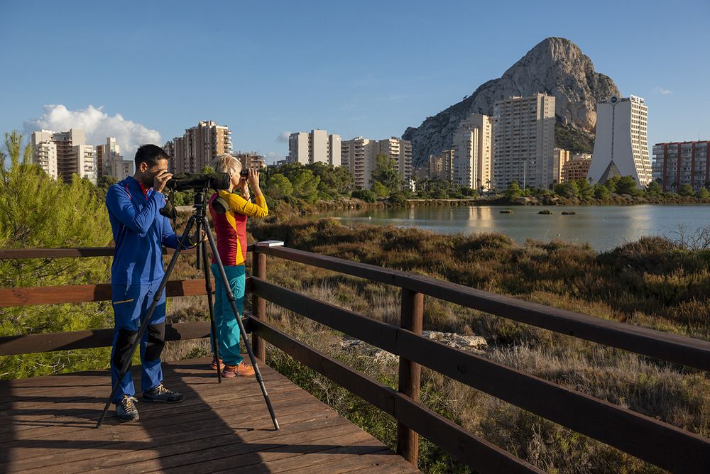 a photographer taking pictures at Calpe Salt Lake.